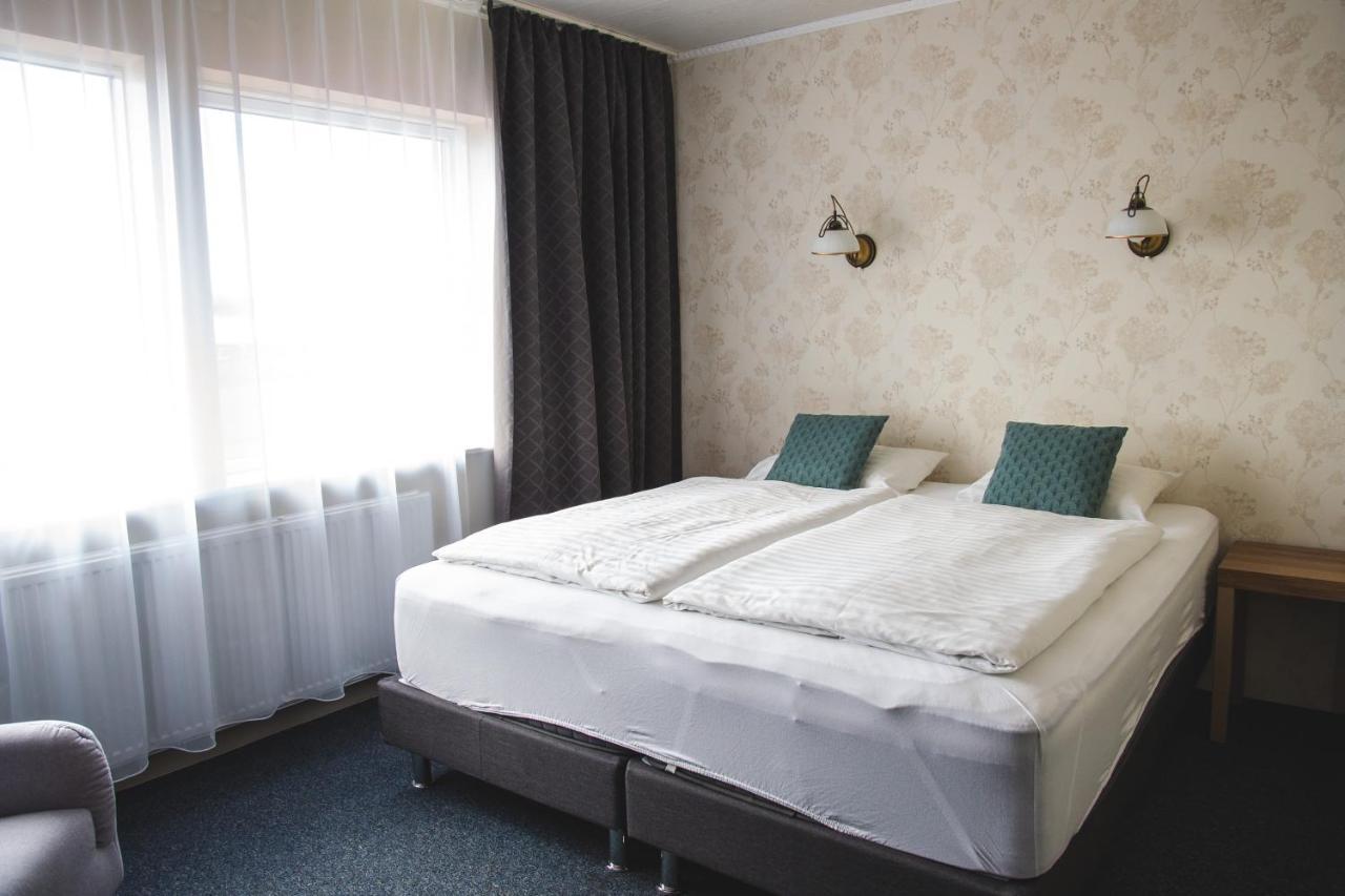 Doppel- oder Zweibettzimmer