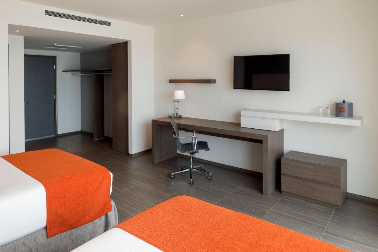 Quarto Deluxe com 2 Camas - Vista Avenida