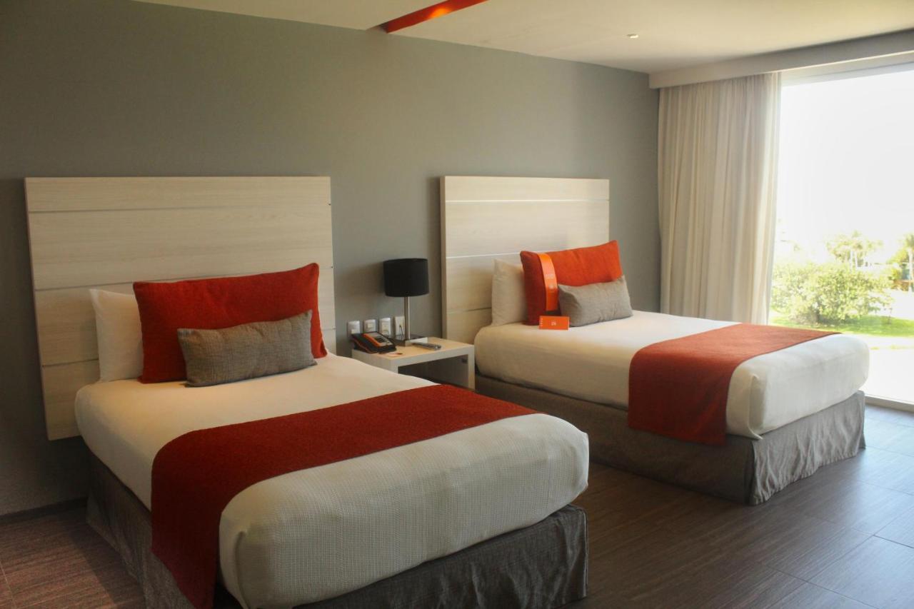 Quarto Deluxe com 2 Camas - Vista Lagoa
