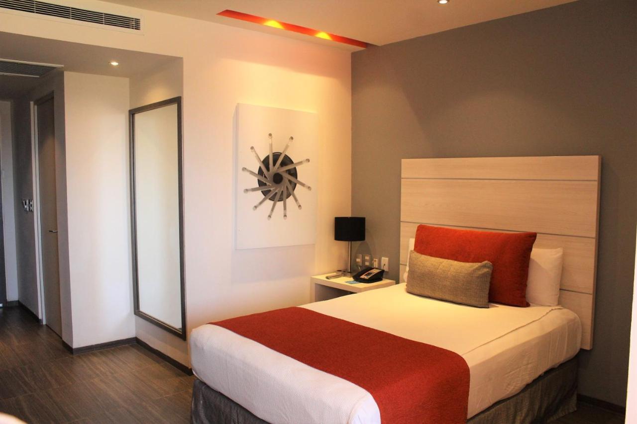Quarto Duplo Executivo - Vista Avenida