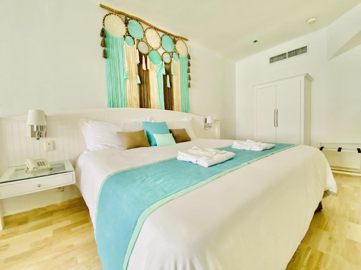 Quarto com Cama King-size e Vista do Mar