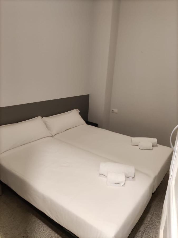 Habitación Individual Económica con baño compartido