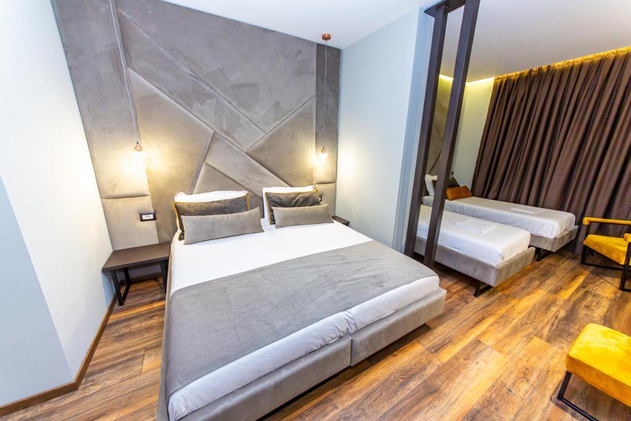 Deluxe Vierpersoonskamer met Balkon - Begane Grond