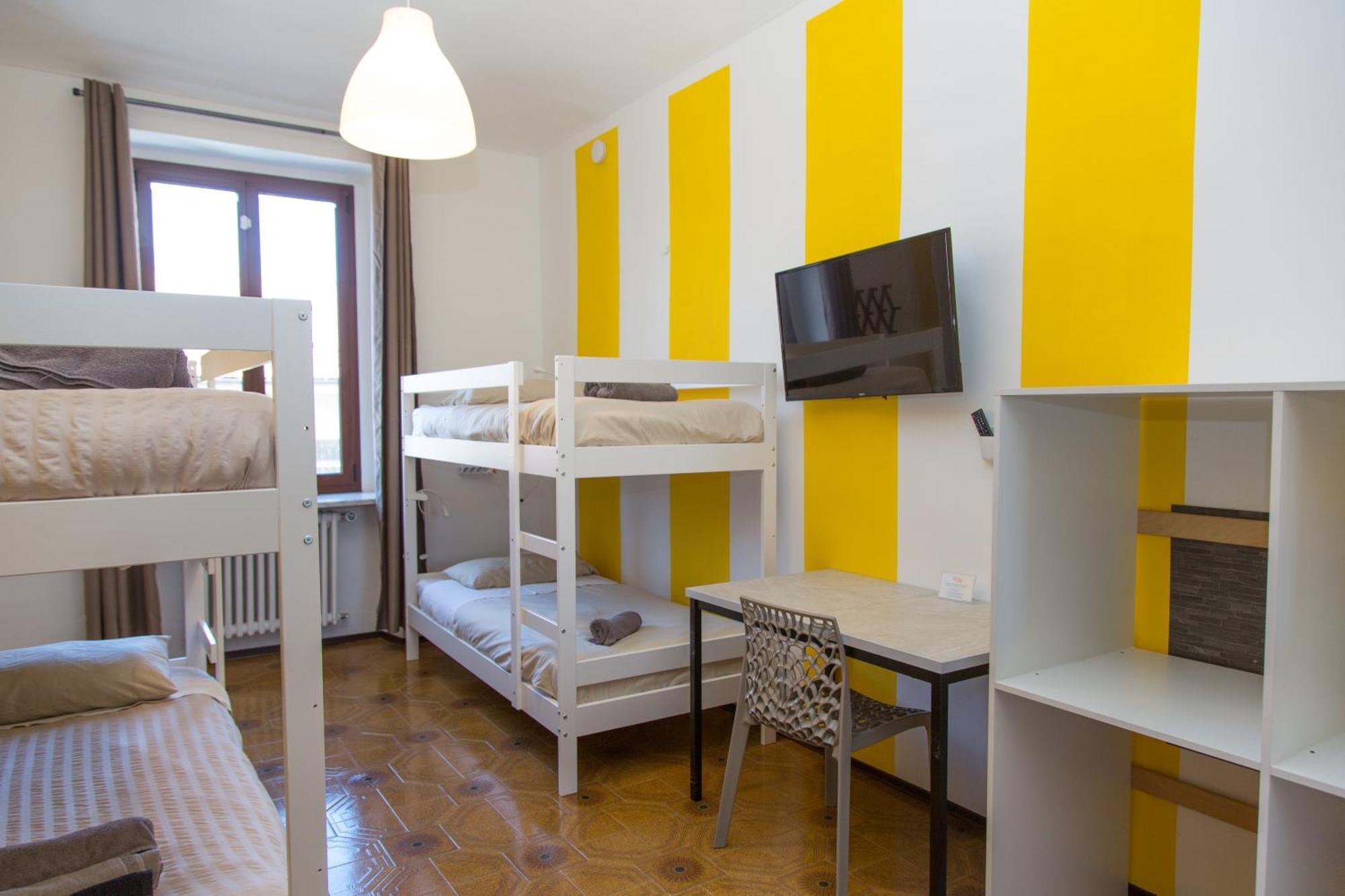 Camera Quadrupla con Bagno in Comune