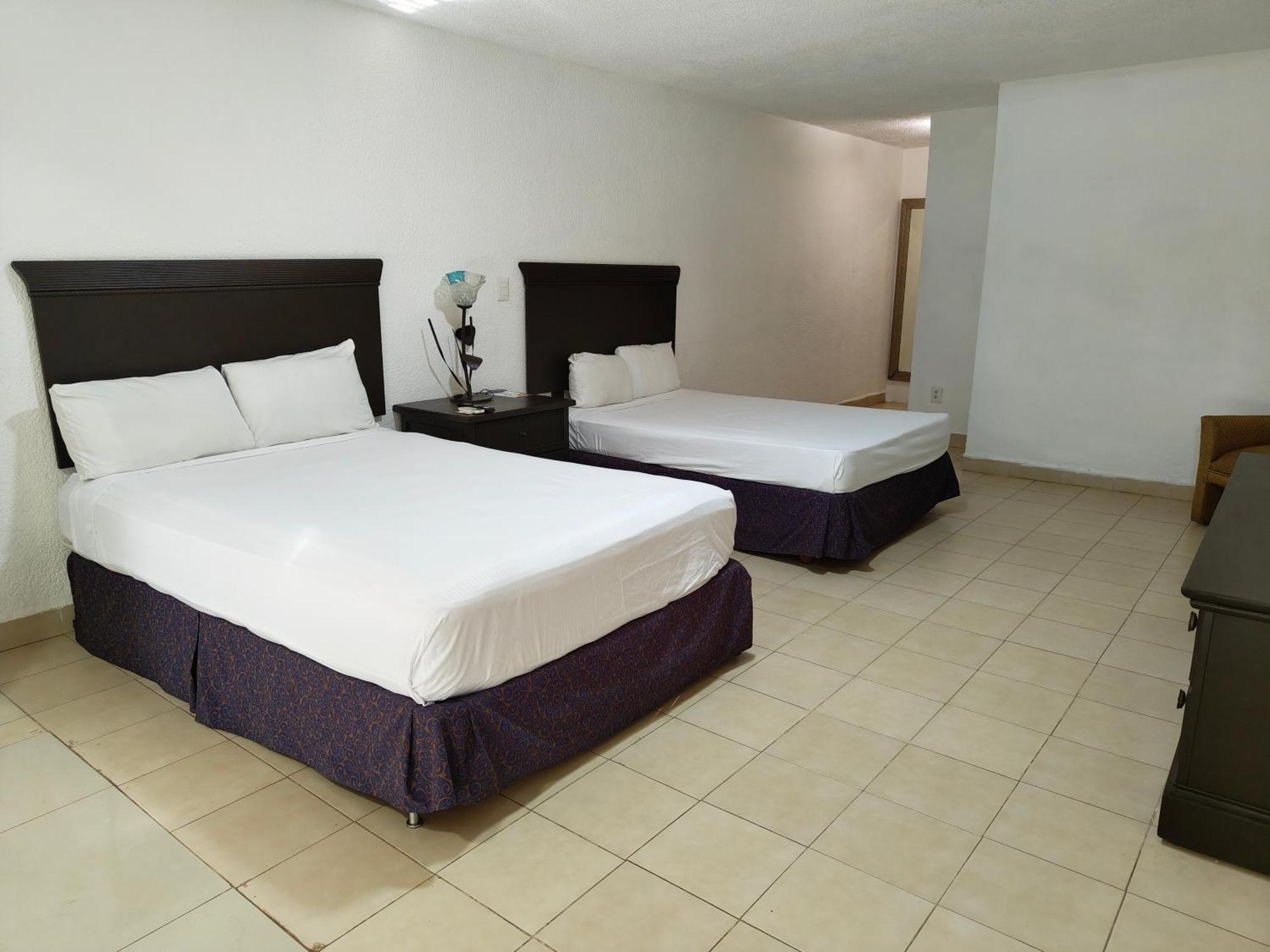 Quarto com 2 Camas de Solteiro