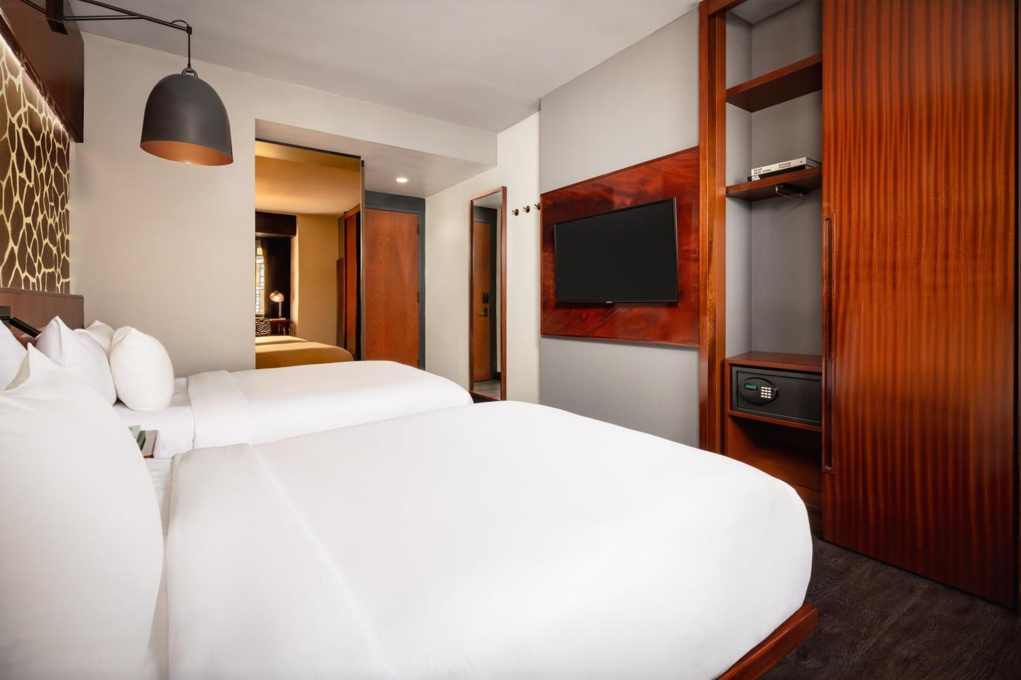 Deluxe Kamer met Twee Tweepersoonsbedden