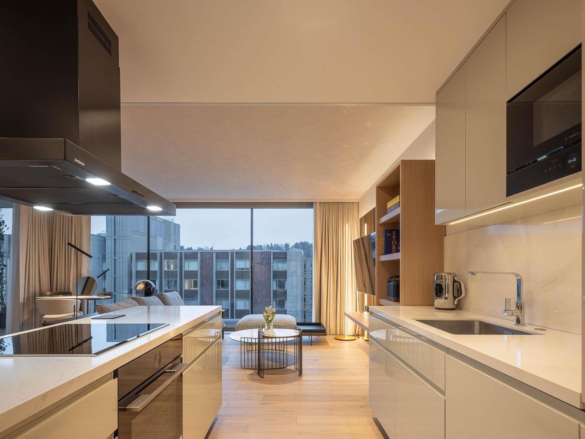 Residencia de 1 dormitorio con cama extragrande y cocina