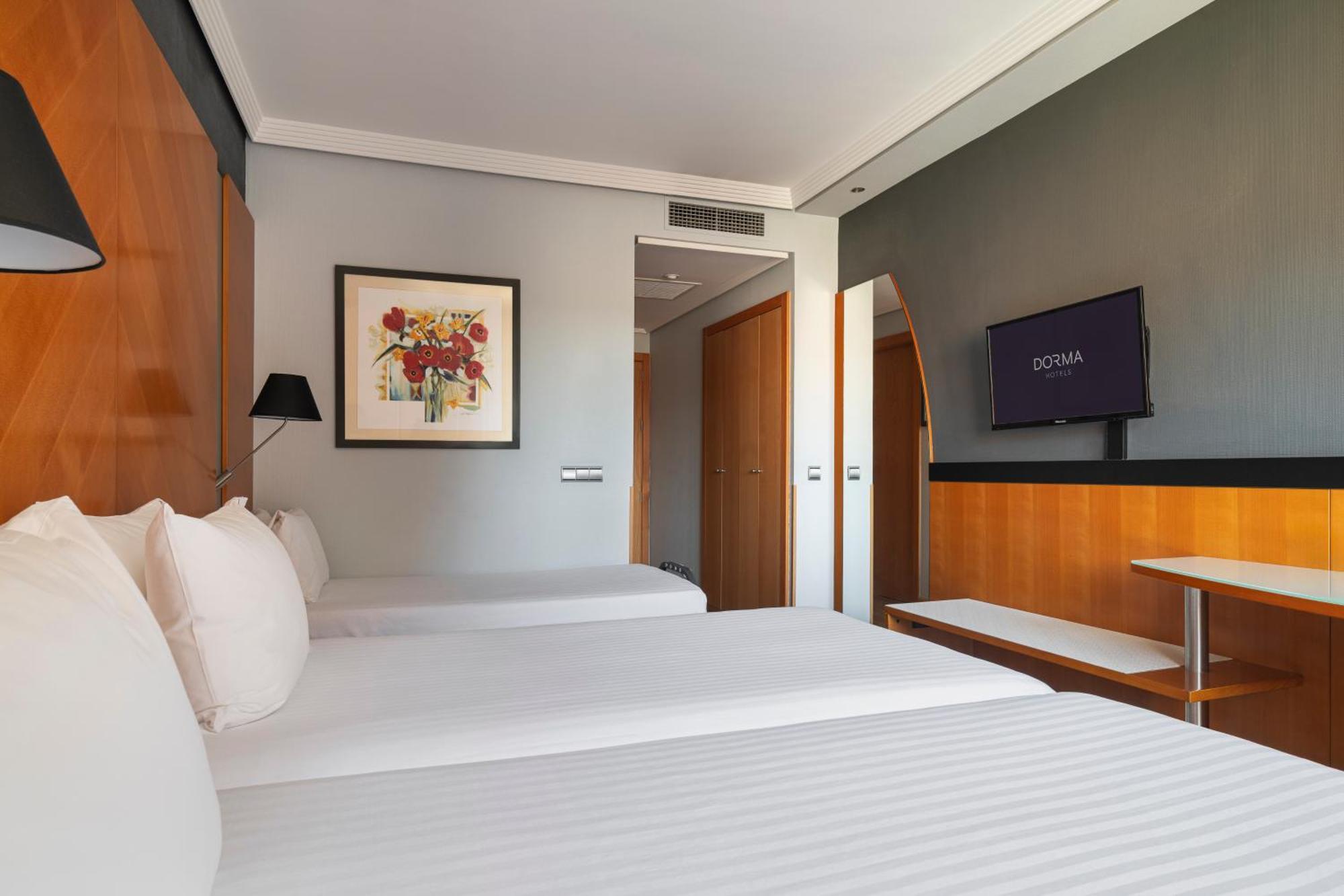 Tweepersoonskamer met 1 of 2 Bedden en een Extra Bed