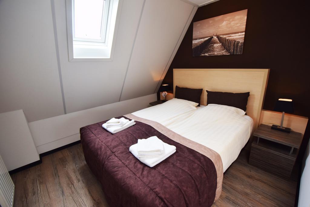 Deluxe tweepersoonskamer met balkon en uitzicht op zee