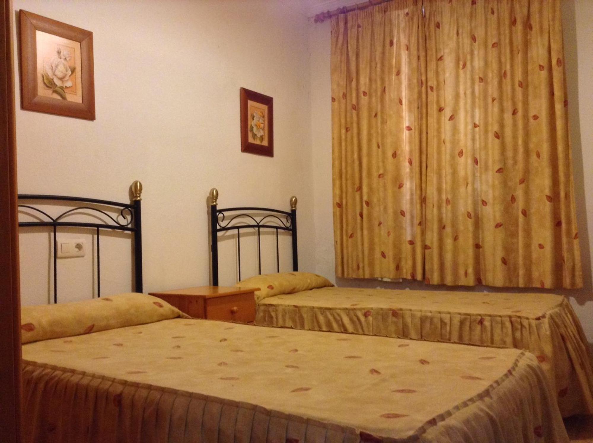 Tweepersoonskamer met 1 of 2 Bedden en Gedeelde Badkamer