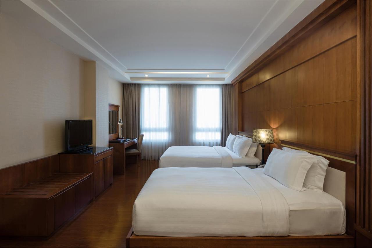 Premium Deluxe Triple Room with City View,719124757:JPEG