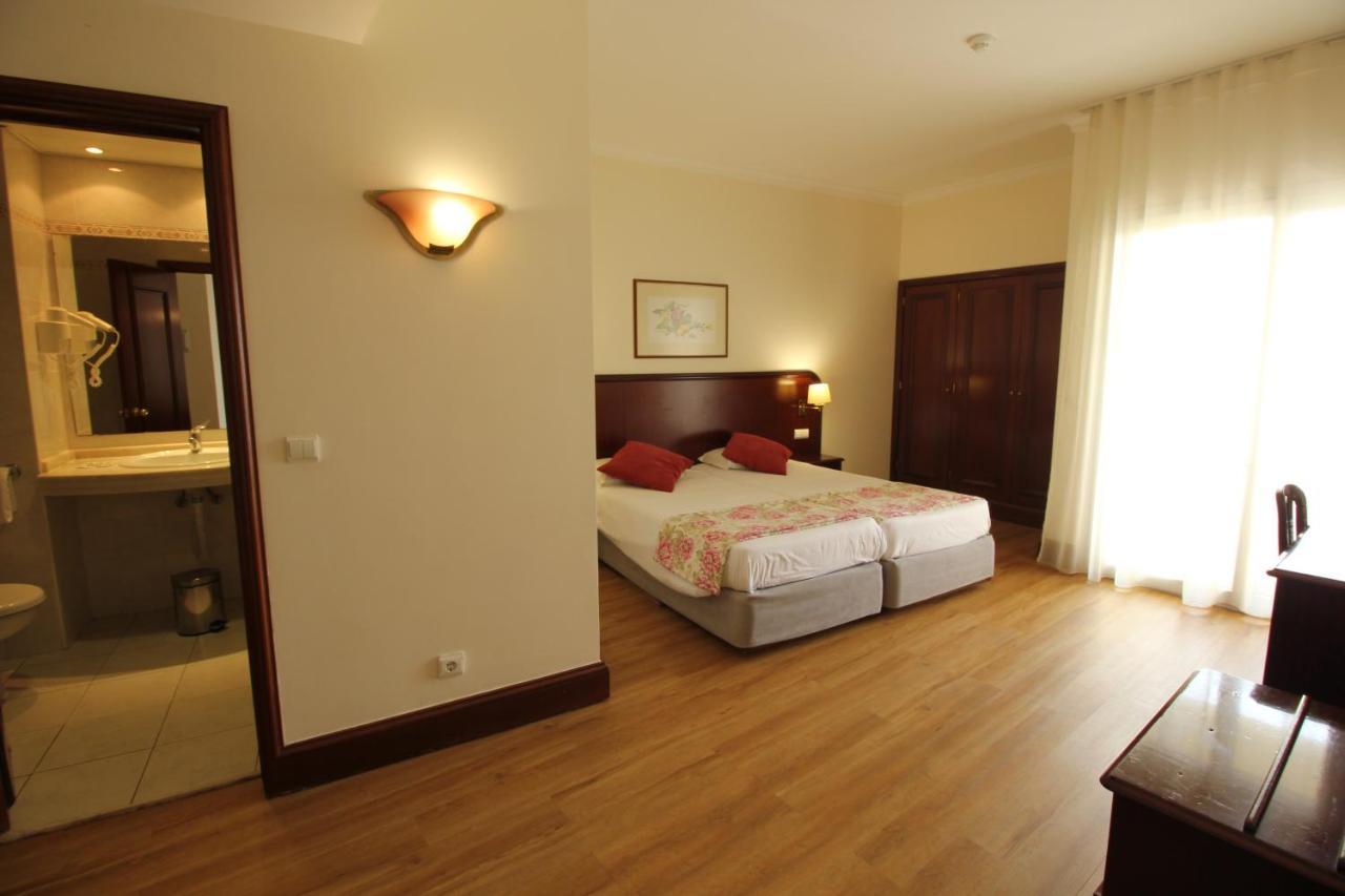 Quarto Standard com 2 Camas de Solteiro e Varanda