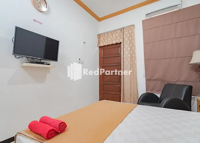 Langkar Guest House Syariah Mitra Reddoorz