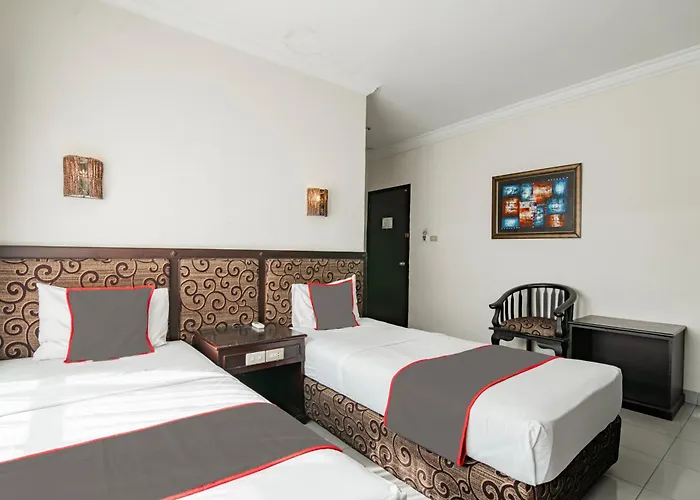 Collection O Senapelan Near Rsud Petala Bumi Formerly De Town Hotel