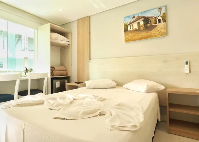Pousada Lírios do Campo Hidromassagem - Sauna-Ar condicionado - Piscina - salão de jogos - 200 metros da praia Jabaquara