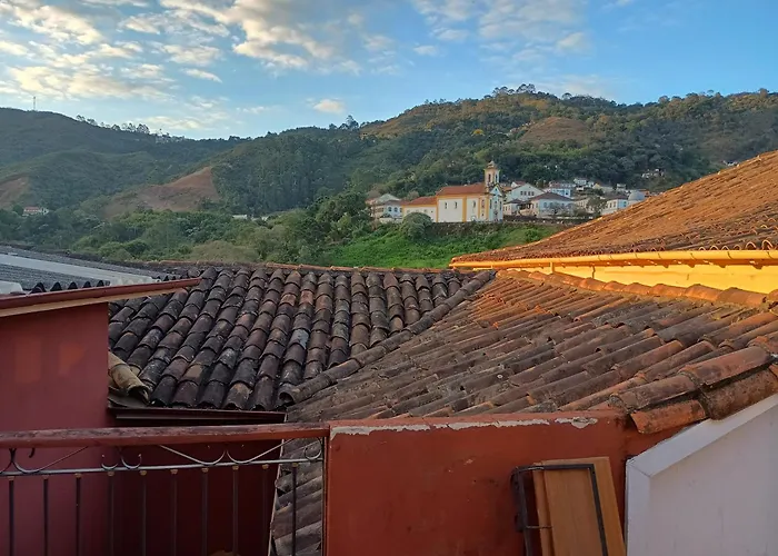 CASA RAIZ cama café e prosa