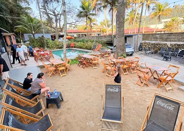 Frente ao Mar - Suites com Piscina Aquecida, SPA Privativo, Vista ao Mar ou Montanha, com Estacionamento- Raizes do Mar ECO Hotel