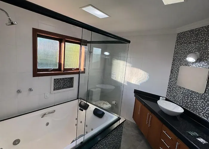 Pousada Bliss House - Opções de suites com hidromassagem