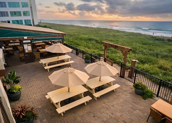 Palms Resort & Cafe On The Beach