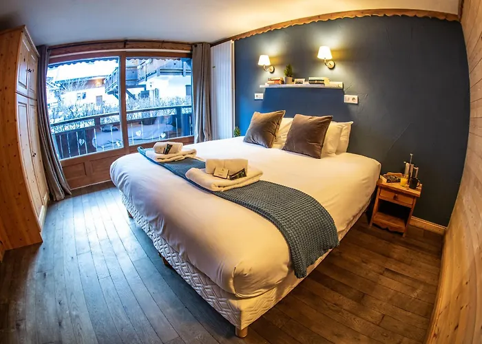 Atlas Ski - Bike Lodge, Catered Boutique Hotel in Central Morzine